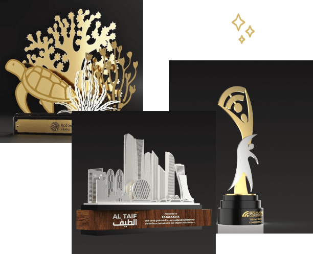 Customised trophy in Dubai, a gold coral and turtle award beside a skyline model